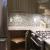 Dutch Colonial Kitchen Remodel:
Semi-custom cabinetry and color, functional inserts for small space organization, tile design, and space planning.